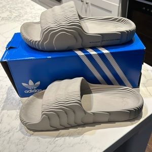 Brand new pair of Adidas Adilette 22 Size 12 Light Brown